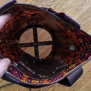 Elegant Brown Leather Tote with Patterned Interior